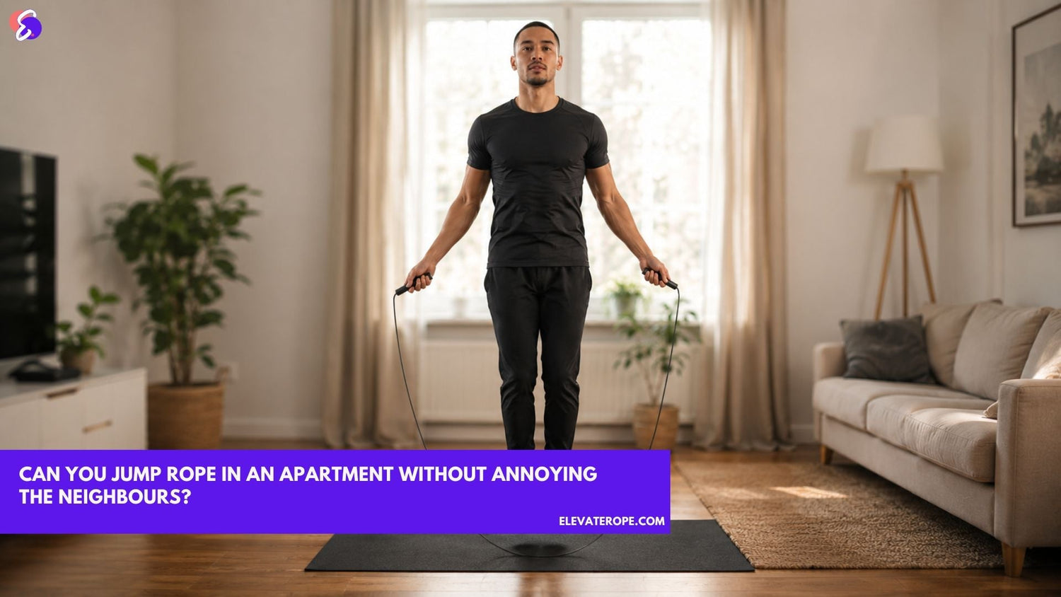 Person doing a quiet low jump rope bounce on a mat in an apartment living room