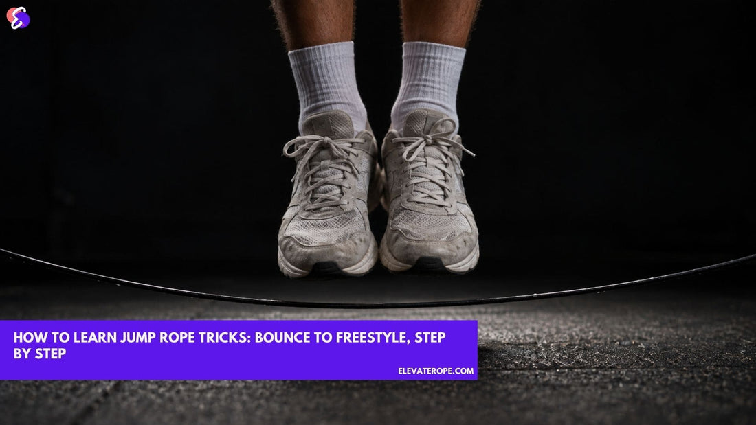 Floor-level close-up of a jumper's feet an inch off the ground with the jump rope passing underneath, lit by a single overhead pool of light.