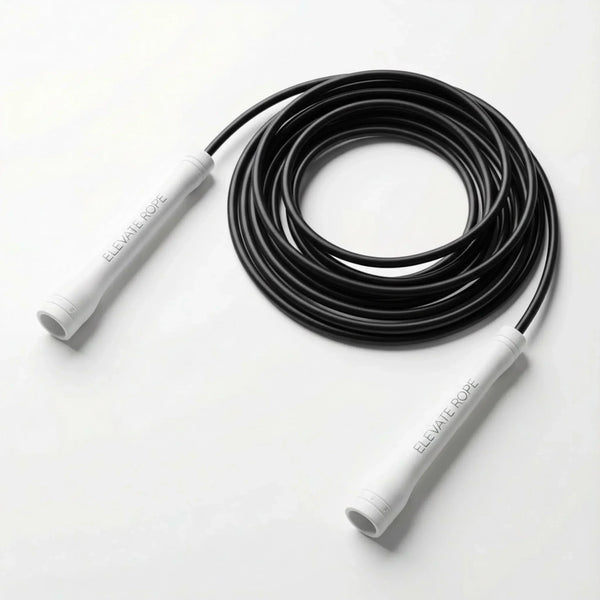 Black jump rope with white handles labeled ELEVATE ROPE, coiled on white background for fitness training.