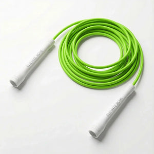 Bright green jump rope with white handles for fitness and full-body workouts on white background